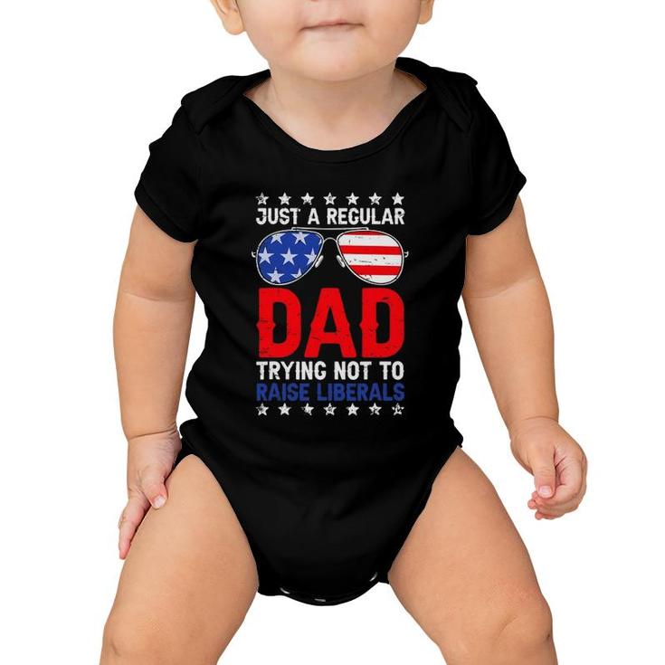 Just A Regular Dad Trying Not To Raise Liberals Voted Trump Baby Onesie